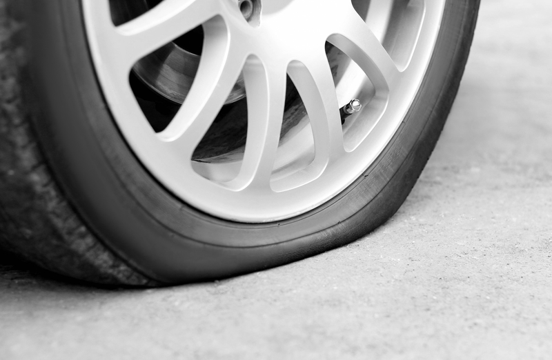 Utica Woman Charged for Slashing Tires