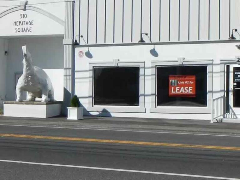 Have you ever dreamed of opening a business next to the bayville dinosaur? Now you can - photo licensed by shore news network.
