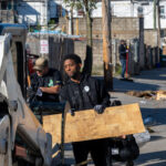 Volunteers Help Cleanup Areas of Baltimore