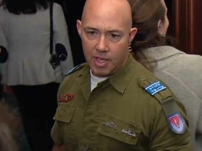 Tlaib has her flag, i have my uniform as congressman dons idf service top - photo licensed by shore news network.