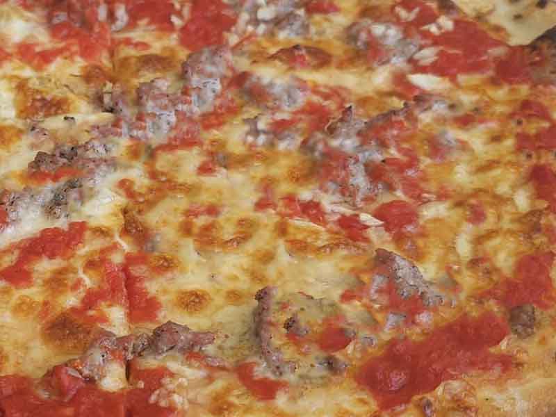 This Hamilton Pizzeria Has the Best Sausage Pie, and Today is National Sausage Pizza Day