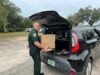 Escambia county sheriff's office distributes 30,000 pounds of thanksgiving meals