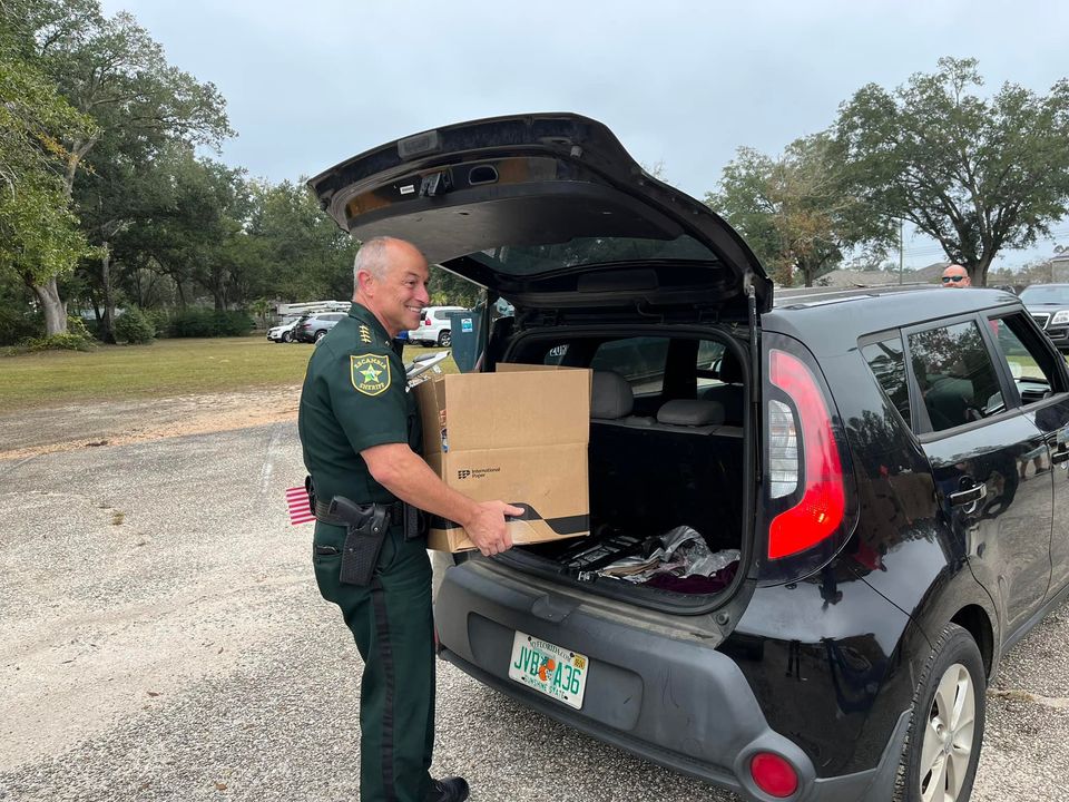 Escambia County Sheriff's Office Distributes 30,000 Pounds of Thanksgiving Meals