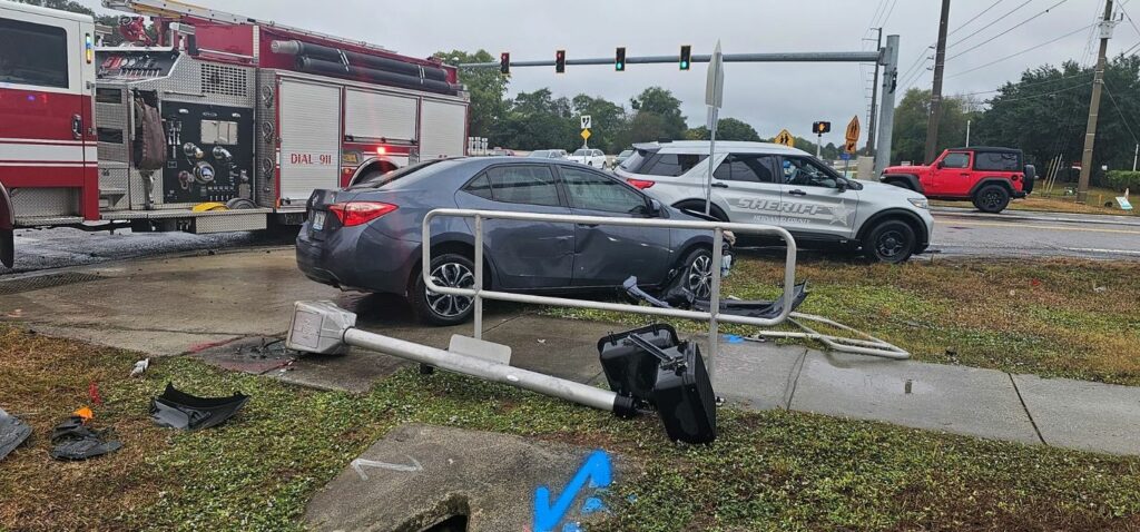 School Crossing Guard Escapes Serious Injury After Vehicle Crashes Nearby