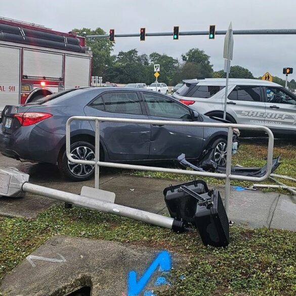 School crossing guard escapes serious injury after vehicle crashes nearby - photo licensed by shore news network.