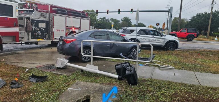School crossing guard escapes serious injury after vehicle crashes nearby - photo licensed by shore news network.