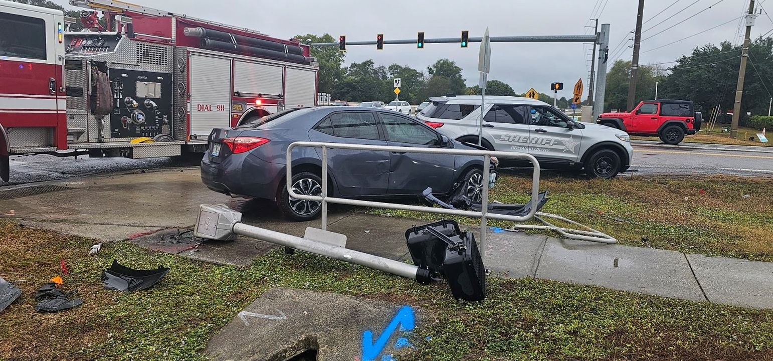 School Crossing Guard Escapes Serious Injury After Vehicle Crashes Nearby