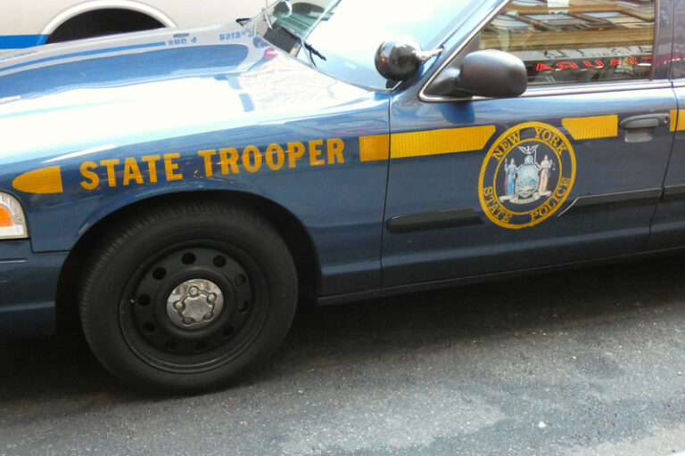 A new york state police car parked in manhattan. The new york state police is the official state police force of the u. S. State of new york, and employs over 5,000 sworn state troopers.