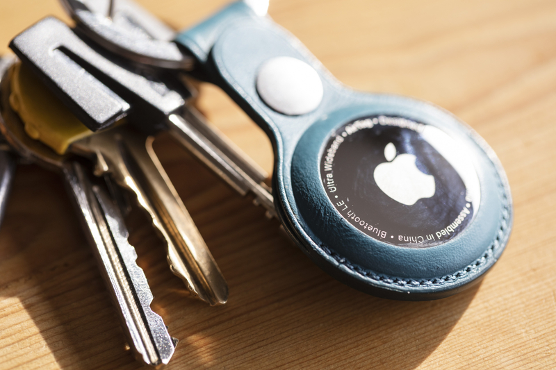 Apple air tag device that helps people keep track of personal items.