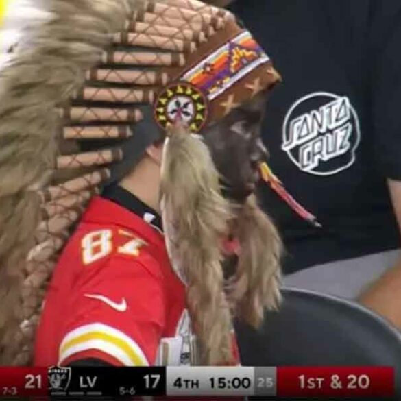 Boy slandered by woke journalist for 'black face' and headdress at chiefs game is native american - photo licensed by shore news network.