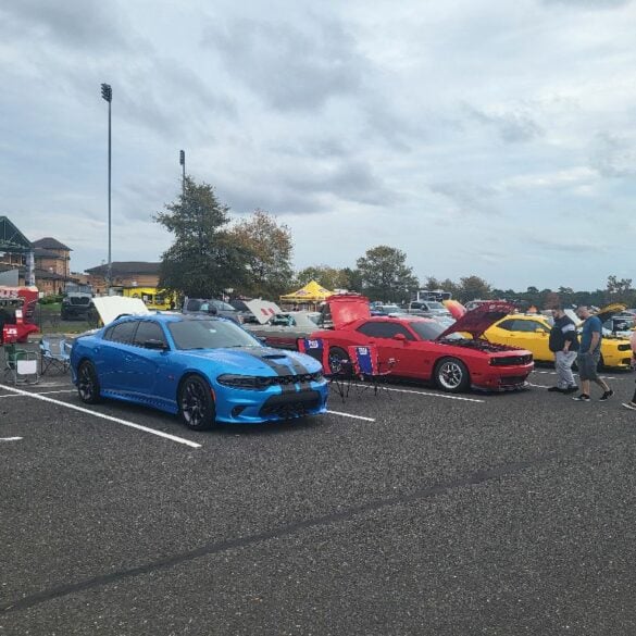 The lakewood township police benevolent association's second annual "cars for a cause" auto show, despite early rain, attracted enthusiasts with over 80 vehicles on october 29, filling the jersey shore blueclaws stadium parking lot.