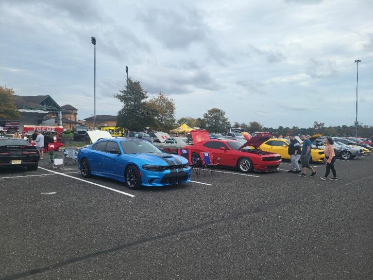 The lakewood township police benevolent association's second annual "cars for a cause" auto show, despite early rain, attracted enthusiasts with over 80 vehicles on october 29, filling the jersey shore blueclaws stadium parking lot.