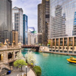 Chicago, Illinois, USA sightseeing cruise and skyline on the river