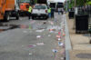 Police say dead body found in trash can with gunshot wounds