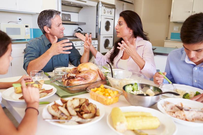 Family arguing at dinner on Thanksgiving