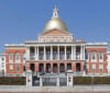 Front view of capitol building, boston, massachusetts, against a blue sky