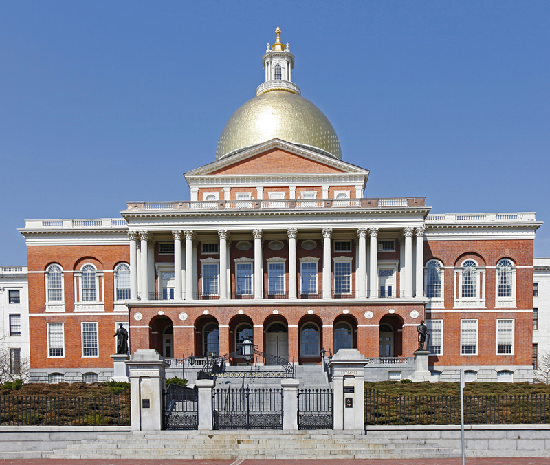 Front view of Capitol Building, Boston, Massachusetts, against a blue sky
