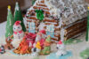 Gingerbread house scene sits on display at christmas festival contest