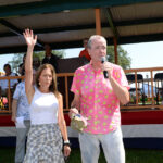 New Jersey Governor Phil Murphy R and First Lady Tammy Murphy greet parade-goers during the 61st Annual Labor Day Parade in south Plainfield