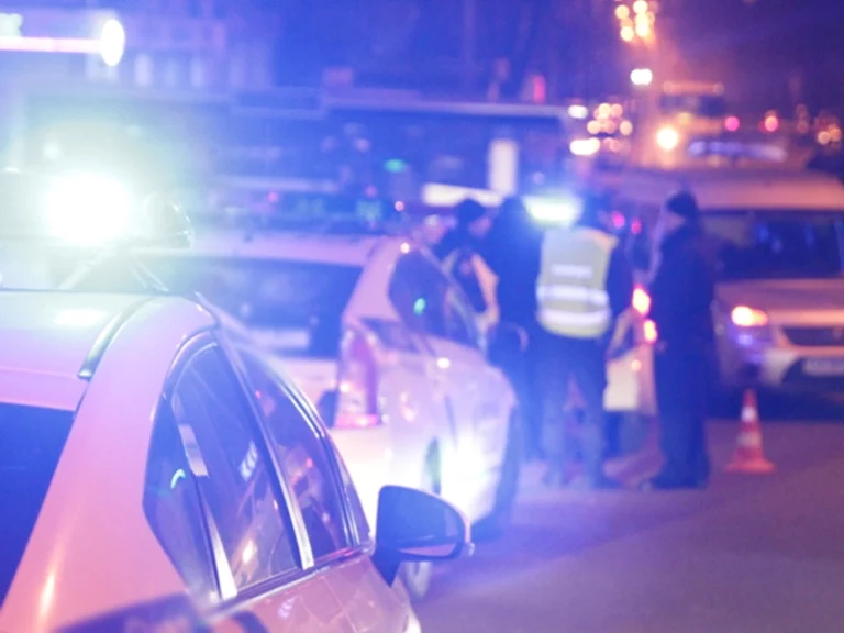 Police - traffic enforcement with lights at scene