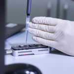 Testing a laboratory sample.