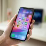 Woman holding an iPhone