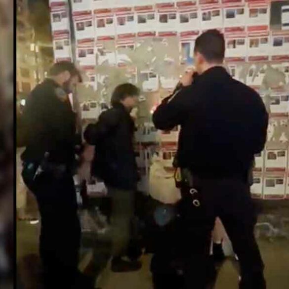 Two arrested in nyc for removing israeli hostage posters - photo licensed by shore news network.