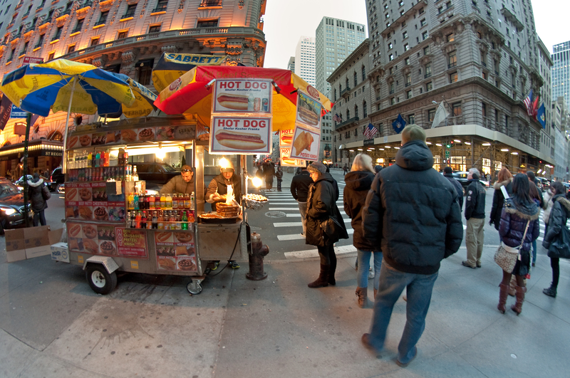 Street Food Carts in walkside, several people, photo taken in Manhattan, NYC