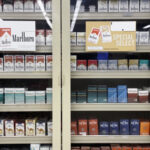 Cigarette display in grocery store.