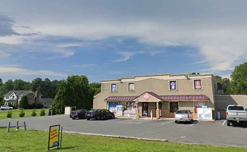 Authorities were called to Liquor Stop at 6129 South Rehoboth Boulevard following a robbery report at 1:09 p.m. Initial reports indicate a white male brandishing a handgun demanded money from a store employee.