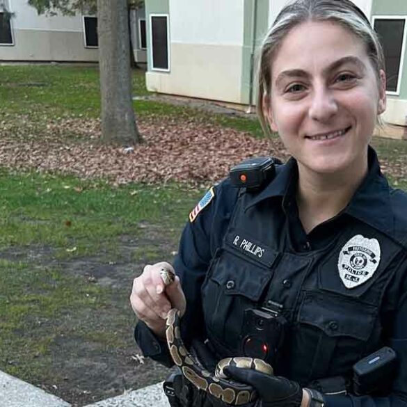 Rutgers campus police officer removes python from dorm