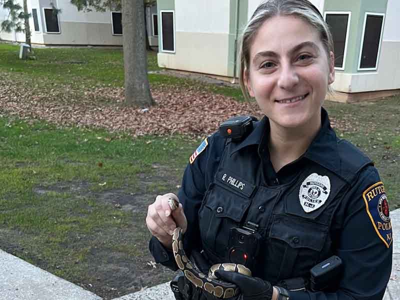Rutgers campus police officer removes python from dorm