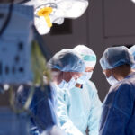 surgeons in operating room at hospital © Syda Productions | Dreamstime.com