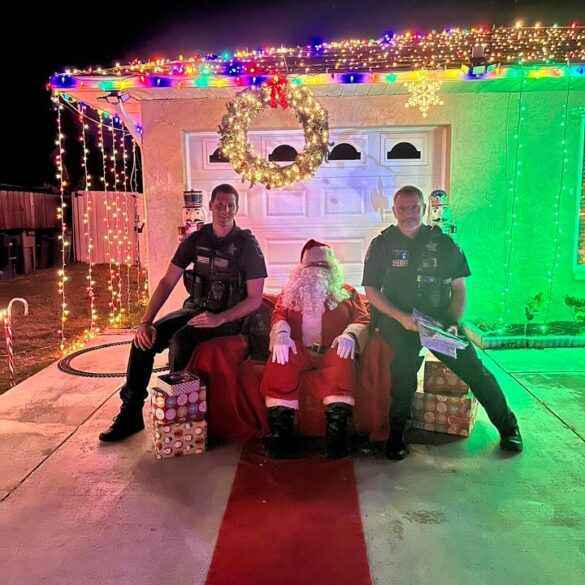 Lee county deputies investigate report of jolly costumed man spreading cheer in neighborhood - photo licensed by shore news network.