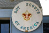 Big wooden sign on a building stating Boy Scouts of America