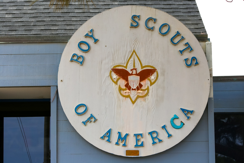 Big wooden sign on a building stating Boy Scouts of America