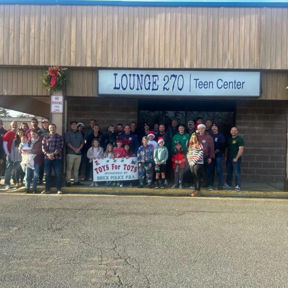 Brick township police department celebrates successful toys for tots drive - photo licensed by shore news network.