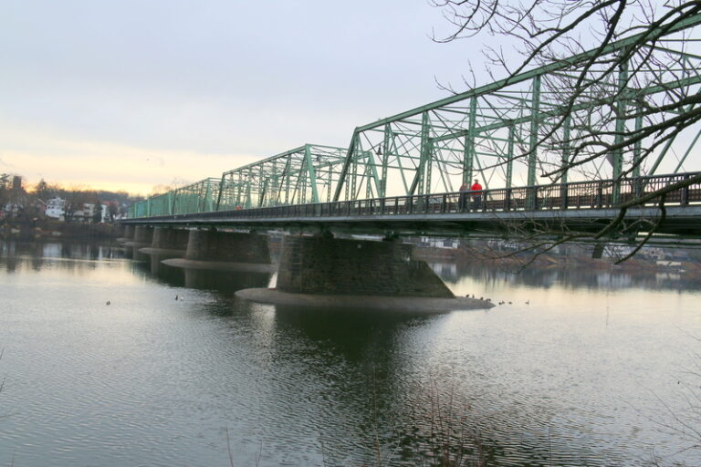 Rising delaware river forces road closures in bucks county - photo licensed by shore news network.