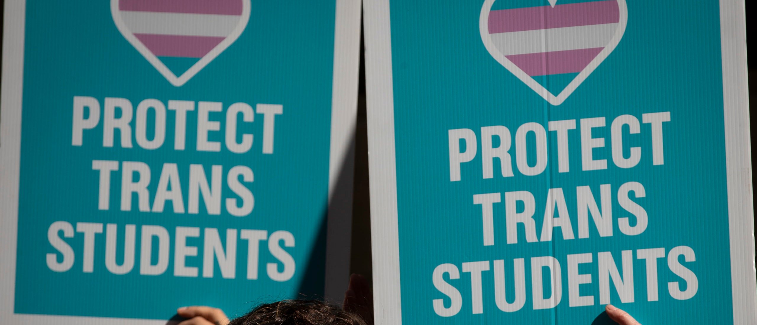 Parents Sue Blue State School District For ‘Intentionally’ Transitioning Daughter Without Their Consent NEW YORK, NY - OCTOBER 24: L.G.B.T. activists and their supporters rally in support of transgender people on the steps of New York City Hall, October 24, 2018 in New York City. The group gathered to speak out against the Trump administration's stance toward transgender people. Last week, The New York Times reported on an unreleased administration memo that proposes a strict biological definition of gender based on a person's genitalia at birth.