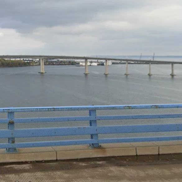 New jersey cops rescue woman from attempted bridge jump - photo licensed by shore news network.