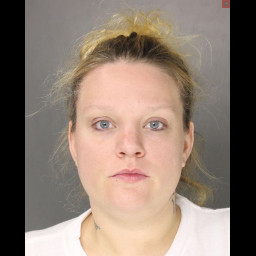 Woman Charged After Throwing Water Bottle At Moving Vhehicle