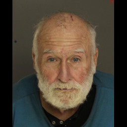 Drunken Man Surrounded by Empty Beer Cans Exposes Himself to Passerby