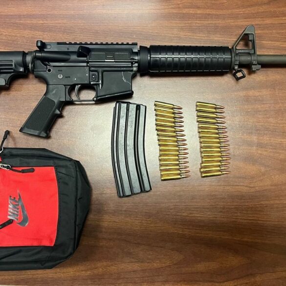 Abandoned car found at baltimore gas station had empty booze bottle, ar-15 - photo licensed by shore news network.