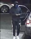 Masked robber in newark on the run in stolen bmw