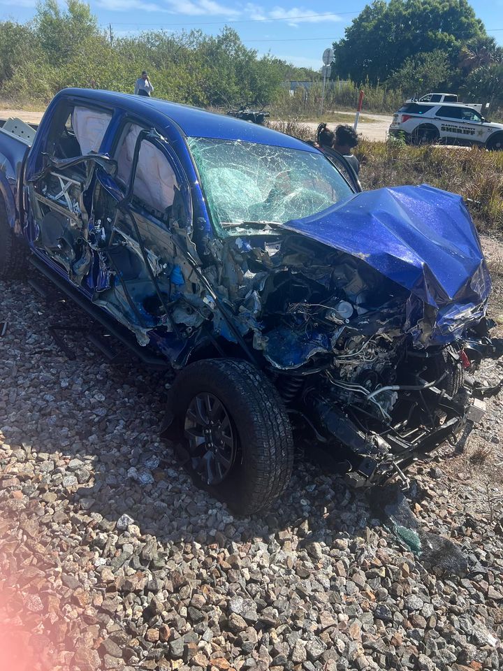 Child Among Three to Safely Exit After Train Struck Car on Tracks