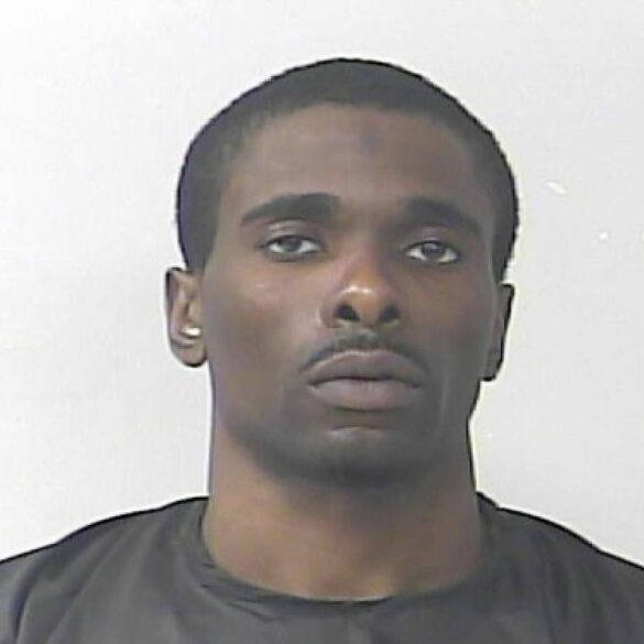 Cop killer cuffed with handcuffs owned by slain officer - photo licensed by shore news network.