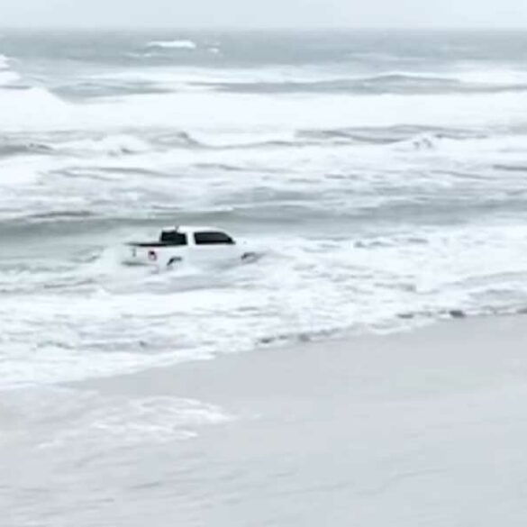 Driver charged for joyriding in the surf in florida - photo licensed by shore news network.
