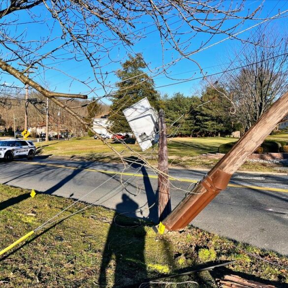 Downed utility pole after hit and run crash in gloucester - photo licensed by shore news network.