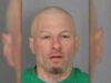 Newark man arrested for impersonating police and drug possession