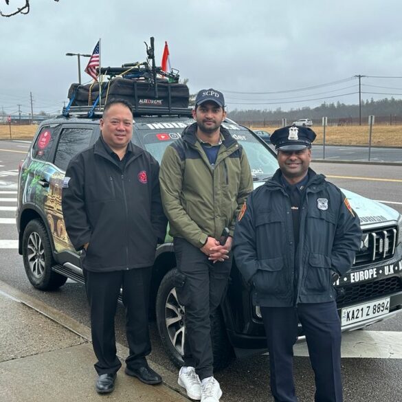 World traveler on quest for guinness record visits suffolk county police - photo licensed by shore news network.